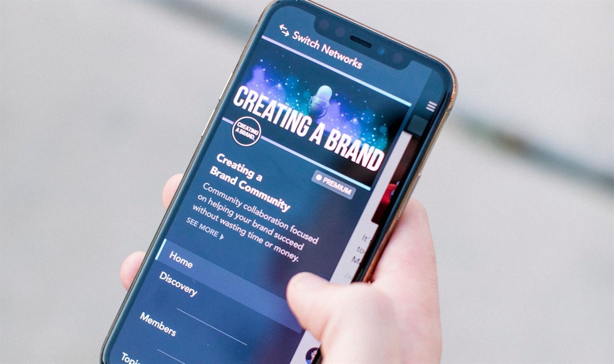A phone screen showing a 'Creating a Brand' community app